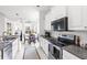 Well-equipped kitchen with stainless steel appliances, granite countertops, and ample cabinet space at 315 Heritage Isles Way, Bradenton, FL 34212