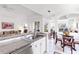 Modern kitchen featuring granite countertops, stainless steel appliances, and an open layout at 315 Heritage Isles Way, Bradenton, FL 34212