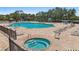 Enjoy community amenities: pools and spas are fenced offering an inviting place to unwind at 315 Heritage Isles Way, Bradenton, FL 34212