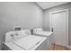 Clean laundry area with washer and dryer, offering practical functionality and efficiency at 3193 Bellevue St, Sarasota, FL 34237