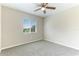 Bright bedroom featuring a ceiling fan and a window with bright, natural light at 3303 Pine Top Dr, Valrico, FL 33594