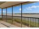 Enjoy stunning water views from this screened balcony, with lush greenery below at 3540 Gulf Of Mexico Dr # 303, Longboat Key, FL 34228