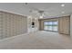 Bedroom with water view, ceiling fan, and built-in shelving at 3540 Gulf Of Mexico Dr # 303, Longboat Key, FL 34228