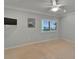 Bedroom with neutral walls, carpet and ceiling fan at 3540 Gulf Of Mexico Dr # 303, Longboat Key, FL 34228