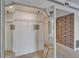 Mirrored closet with wire shelves and storage at 3540 Gulf Of Mexico Dr # 303, Longboat Key, FL 34228