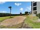 Well-maintained condo complex with lush landscaping, creating a serene and inviting atmosphere for residents at 3540 Gulf Of Mexico Dr # 303, Longboat Key, FL 34228
