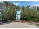 Private Kayak Launch surrounded by greenery and trees, providing direct access to the tranquil waterways at 3540 Gulf Of Mexico Dr # 303, Longboat Key, FL 34228