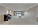 Spacious living room featuring neutral tones and natural light at 3540 Gulf Of Mexico Dr # 303, Longboat Key, FL 34228