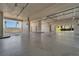 Spacious parking garage with concrete floor and multiple parking spots available for residents and guests at 3540 Gulf Of Mexico Dr # 303, Longboat Key, FL 34228