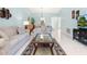 Bright living room featuring tile floors, comfortable seating, and an open floor plan at 3627 Longmeadow # 39, Sarasota, FL 34235