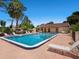 Enjoy the community pool with ample lounge seating and a clubhouse for residents at 3627 Longmeadow # 39, Sarasota, FL 34235