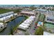 Picturesque condos, showcasing waterfront, community pool, tennis court, and easy access to amenities and shopping at 3803 E Bay Dr # 10, Bradenton Beach, FL 34217