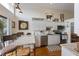 Eat-in kitchen with stainless steel appliances, tile backsplash, and decorative touches at 3803 E Bay Dr # 10, Bradenton Beach, FL 34217