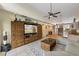 Open-concept living room with a vaulted ceiling leading into the dining area at 3803 E Bay Dr # 10, Bradenton Beach, FL 34217
