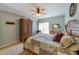 Spacious main bedroom with neutral colors and an expansive window at 3803 E Bay Dr # 10, Bradenton Beach, FL 34217
