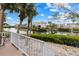 Serene water view of the pond from the backyard patio at 3803 E Bay Dr # 10, Bradenton Beach, FL 34217