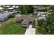 Property with a lush backyard, complete with an in-ground swimming pool at 417 20Th W Ave, Palmetto, FL 34221