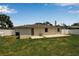 Enjoy the backyard with a cozy patio that is perfect for relaxation and outdoor entertainment at 417 20Th W Ave, Palmetto, FL 34221