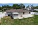 A spacious backyard with a patio, providing an ideal outdoor living space at 417 20Th W Ave, Palmetto, FL 34221