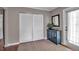 Welcoming entryway featuring closet, cabinet with decor, wood floors, and an abundance of natural light at 417 20Th W Ave, Palmetto, FL 34221