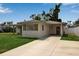 Attractive single-Gathering home with a convenient carport and well-kept landscaping at 417 20Th W Ave, Palmetto, FL 34221
