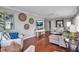 Spacious living room with hardwood floors, stylish furnishings, and plenty of natural light at 417 20Th W Ave, Palmetto, FL 34221
