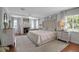 Bright main bedroom showcasing a fireplace and luxurious furnishings with accent lighting at 417 20Th W Ave, Palmetto, FL 34221