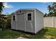 Well-maintained shed with siding, offering ample storage space and easy access from the backyard at 417 20Th W Ave, Palmetto, FL 34221