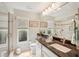 Bathroom featuring a large vanity and a shower with seamless glass door at 431 Fieldstone Dr, Venice, FL 34292