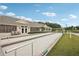 Well-maintained bocce ball court next to a clubhouse, perfect for outdoor recreation at 431 Fieldstone Dr, Venice, FL 34292
