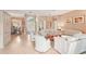 Bright open concept featuring tile floors, soaring ceilings, and entry way with double door entry and a dining room at 431 Fieldstone Dr, Venice, FL 34292