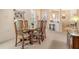 Traditional dining room featuring a wooden table and six chairs with decorative accents at 4322 Reflections Pkwy, Sarasota, FL 34233