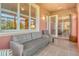 Relaxing outdoor patio features comfortable seating and natural light at 4322 Reflections Pkwy, Sarasota, FL 34233