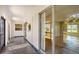 Screened-in porch with view through sliding glass door to living room and exterior at 445 Matisse S Cir # 445, Nokomis, FL 34275