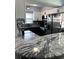 Kitchen with stainless steel appliances, granite countertops and overhead lighting at 4511 3Rd Street W Cir # 289, Bradenton, FL 34207