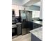 Updated kitchen with stainless steel refrigerator and granite countertops at 4511 3Rd Street W Cir # 289, Bradenton, FL 34207