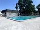 Community pool offers ample seating and shade at 4511 3Rd Street W Cir # 289, Bradenton, FL 34207