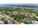 Aerial view of tennis courts and beautiful community landscaping at 4644 Red Maple Rd # 1303, Bradenton, FL 34210