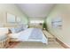 Bedroom featuring a large bed, bright walls, neutral-colored decor, and lots of natural light at 4644 Red Maple Rd # 1303, Bradenton, FL 34210