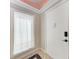 Entryway featuring an interior door, neutral colors, accent lighting, and tile flooring at 4644 Red Maple Rd # 1303, Bradenton, FL 34210