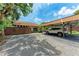 Charming house exterior featuring a carport and a privacy fence at 4644 Red Maple Rd # 1303, Bradenton, FL 34210