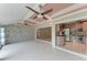 Bright living area with tile flooring and stone accent wall, open to kitchen and other living spaces at 4644 Red Maple Rd # 1303, Bradenton, FL 34210