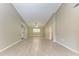 Living room featuring neutral walls, hardwood floors and an entry door at 4644 Red Maple Rd # 1303, Bradenton, FL 34210