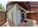 Outdoor patio area with brick pavers and a sliding glass door to the home at 4644 Red Maple Rd # 1303, Bradenton, FL 34210