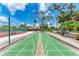 Shuffleboard court with beautiful landscaping and blue sky at 4644 Red Maple Rd # 1303, Bradenton, FL 34210