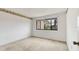 Neutral bedroom with carpet and a large window providing ample natural light at 5273 Myrtle Wood # 37, Sarasota, FL 34235