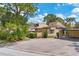 Charming property exterior with lush landscaping, private driveway, and well-maintained surroundings at 5273 Myrtle Wood # 37, Sarasota, FL 34235