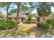 Charming townhouse with well-manicured landscaping, trees, and a private courtyard at 5273 Myrtle Wood # 37, Sarasota, FL 34235