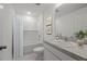 Clean, well-lit bathroom with a shower-tub combo, vanity, and modern fixtures at 5521 Colfax Ter, Port Charlotte, FL 33981