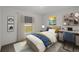 Bright bedroom with a single bed, desk, and window offering plenty of natural light at 5521 Colfax Ter, Port Charlotte, FL 33981